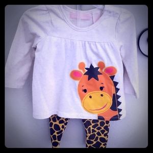 Girls' 12 month giraffe outfit.